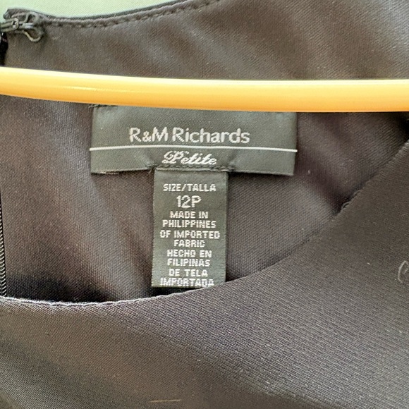 High/low black top with black and pink patterned skirt attached. - Picture 9 of 9